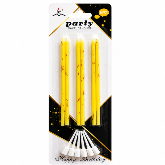 A 4-pack of yellow birthday cake candles with brown flame-like patterns, packaged in a white and black card with 'party CAKE CANDLES' and 'Happy Birthday' text.