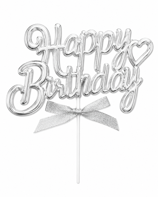 Silver 'Happy Birthday' cake topper with a bow on a white background