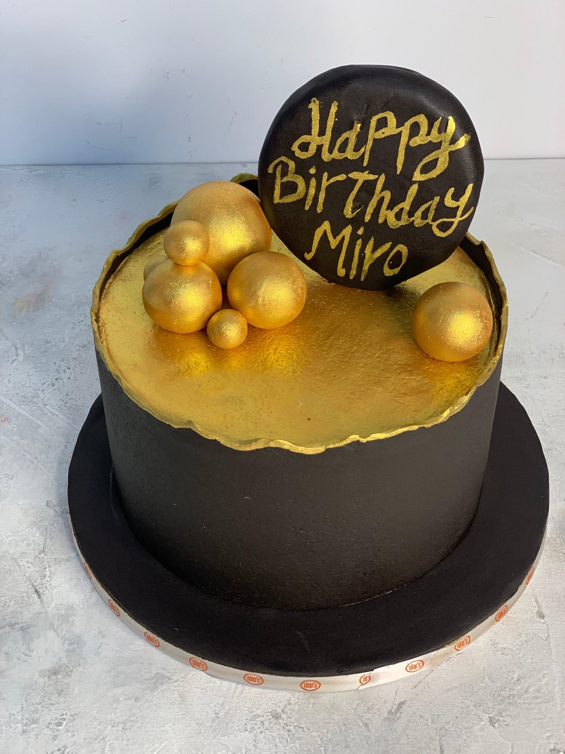 Gold N' Black Cake - Nino’s Bakery