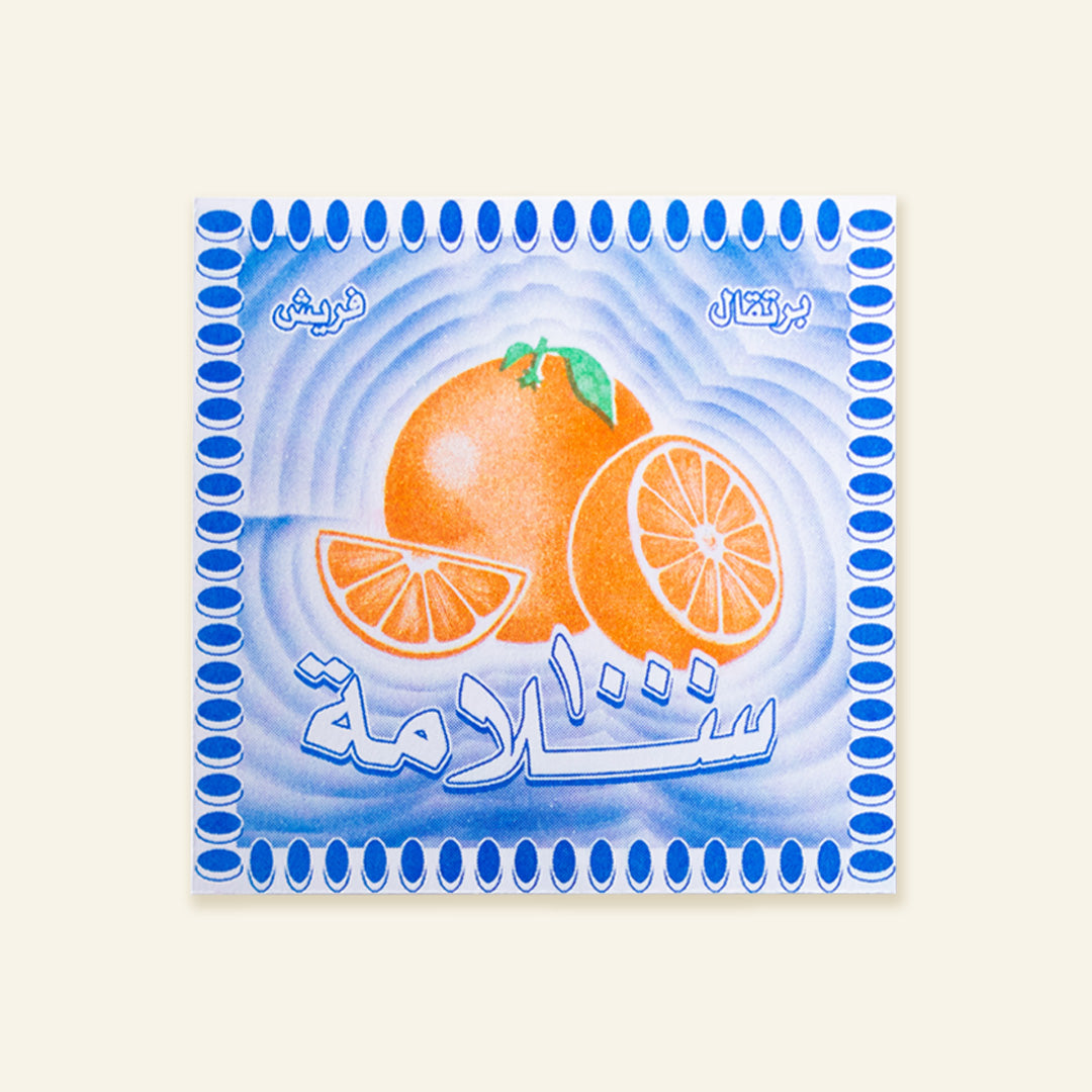 Alf Salama Orange (Well Wishes) card with orange illustration on a light blue background