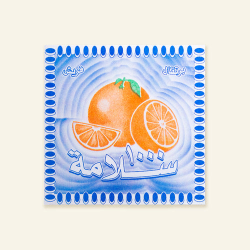 Alf Salama Orange (Well Wishes) card with orange illustration on a light blue background