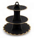 Black and gold three-tiered stand on a white background
