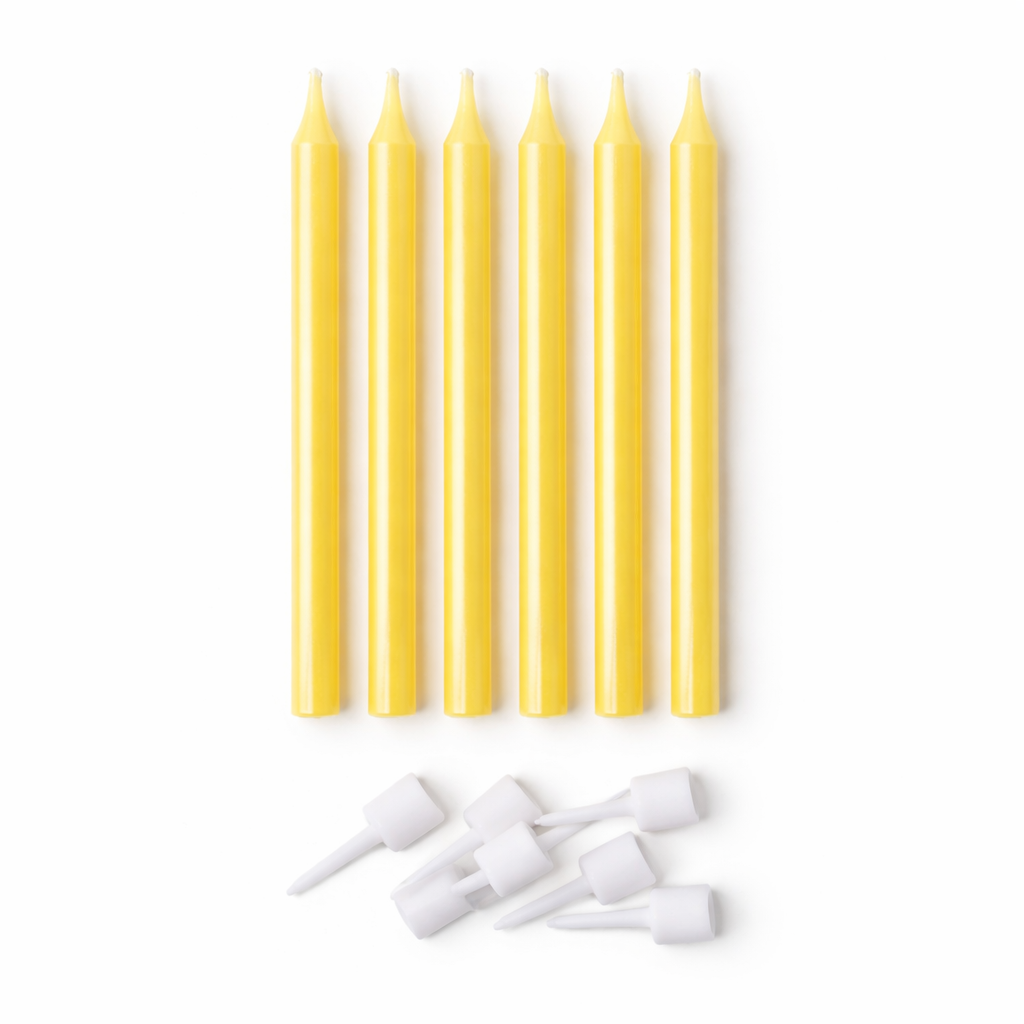 Set of yellow candles and white nozzles