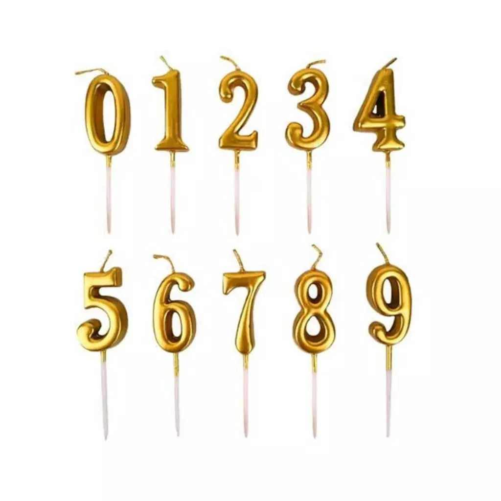A collection of gold birthday candles shaped as numbers from 0 to 9, each attached to a stick.