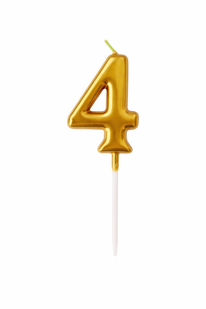 Gold number 4 birthday candle on a white background