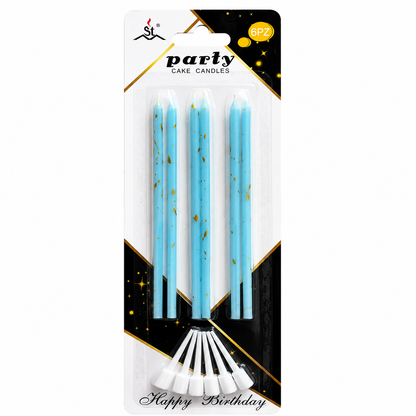 A 4-pack of light blue party cake candles with gold speckles, packaged in a clear blister pack with a white, black, and gold header card that reads 'party CAKE CANDLES' and 'Happy Birthday'.
