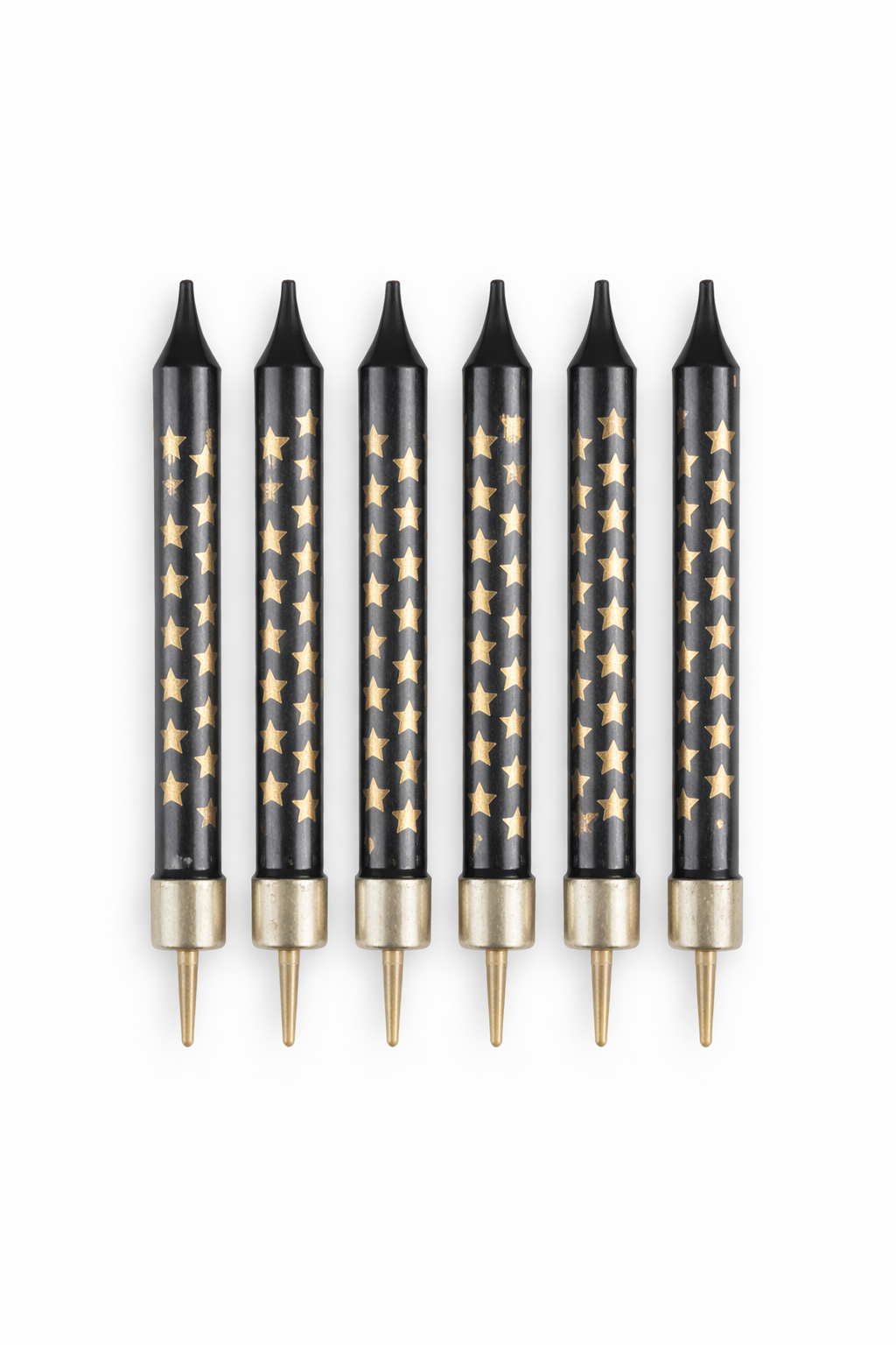 Set of six black pens with gold star patterns on a white background