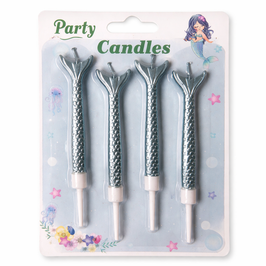 Set of four mermaid tail-shaped party candles on a decorative pack