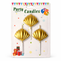 Gold shell-shaped party candles on sticks in packaging with colorful decorations.