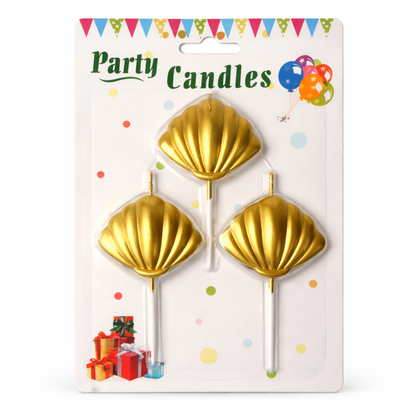Gold shell-shaped party candles on sticks in packaging with colorful decorations.