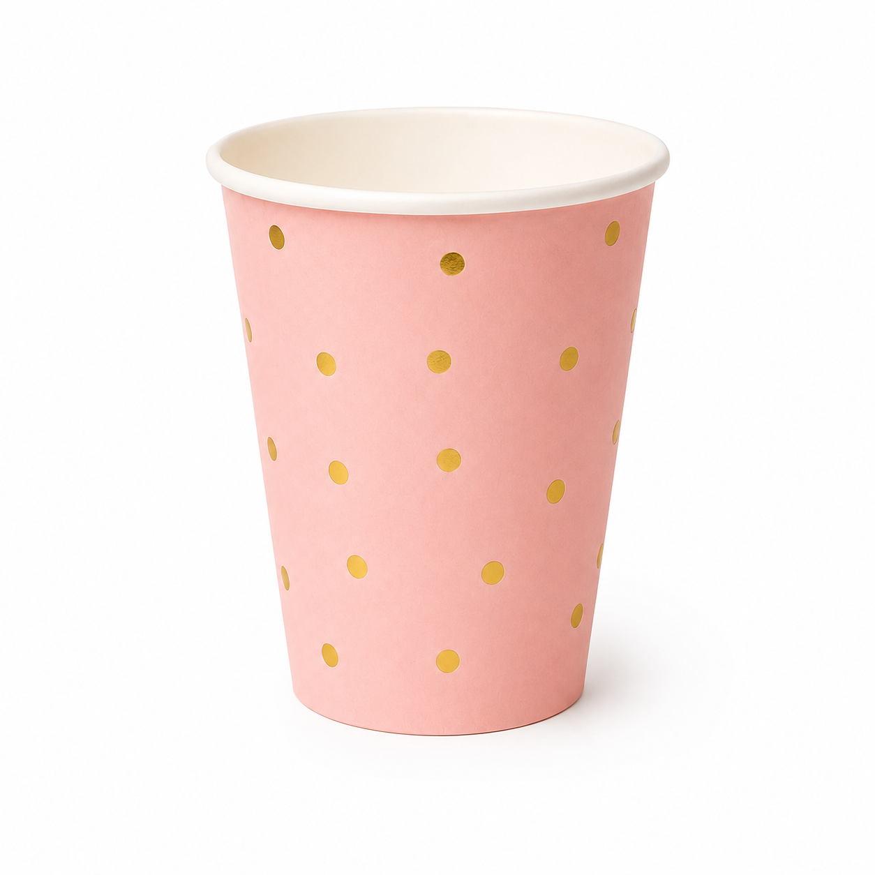 Pink paper cup with gold polka dots on a white background