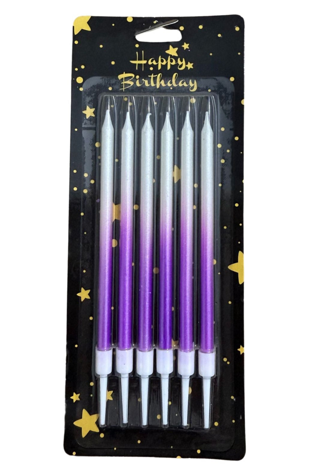 A set of ombre colored candles, with packaging that includes a pink and blue ombre design and a set of pink candles with a similar pattern.