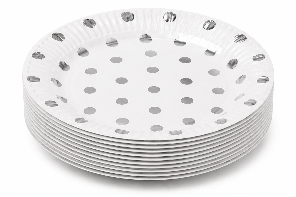 Stack of metallic polka dot paper plates on deep white background