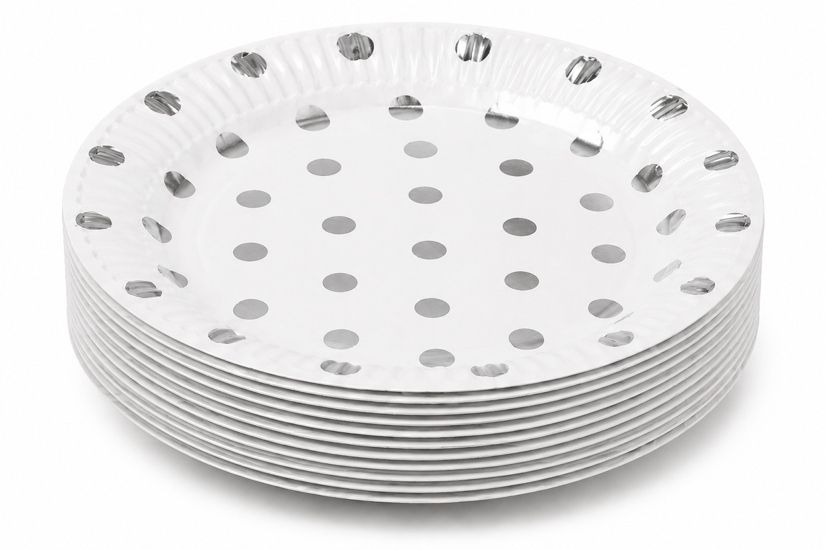 Stack of metallic polka dot paper plates on deep white background