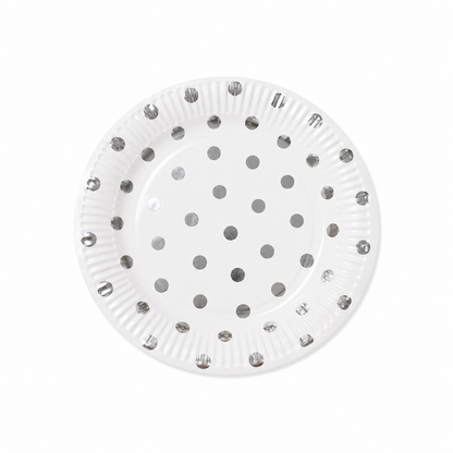 White paper plate with metallic silver polka dot design on white background