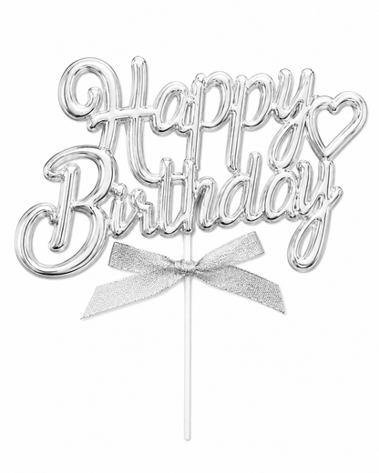 Silver 'Happy Birthday' cake topper with a bow on a white background