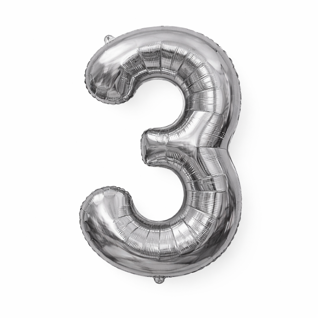 Silver number 3 balloon on a white background