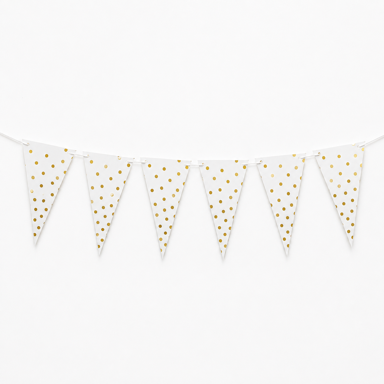 White bunting banner with gold metallic polka dots on triangular pennants, strung along a white cord against a plain white background.