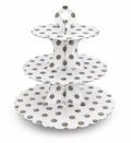 Three-tiered white cake stand with gray polka dots on a white background