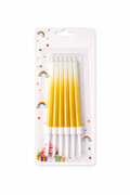 Pack of yellow birthday candles with decorative packaging on a white background
