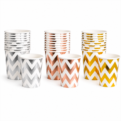 Set of paper cups with chevron pattern in silver, rose gold, and yellow on a white background