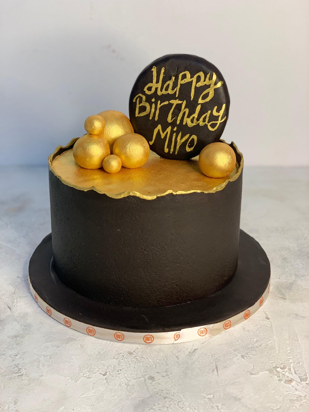 Gold N' Black Cake - Nino’s Bakery