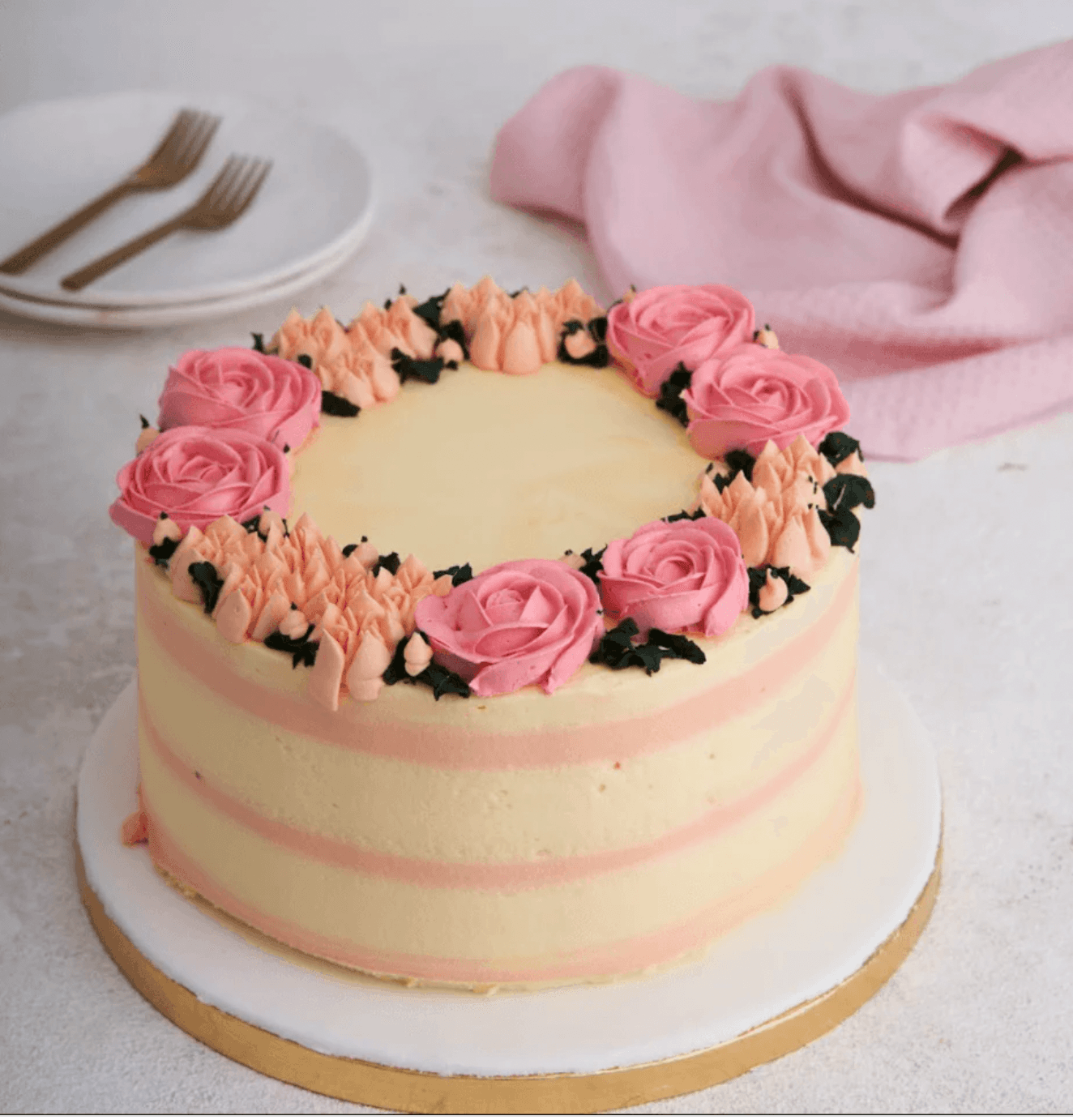 Buttercream iced wedding cake with fresh flowers - - CakesDecor