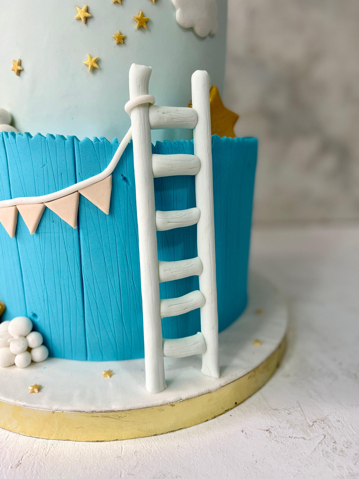 Welcoming A Golden Star Cake - Nino’s Bakery
